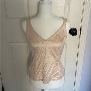 Little baby pink top with a bow In the middle